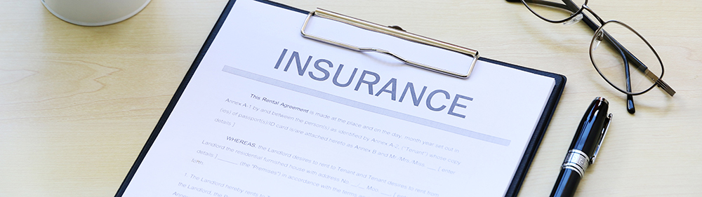 Insurance paper on businessman desk in Office Business