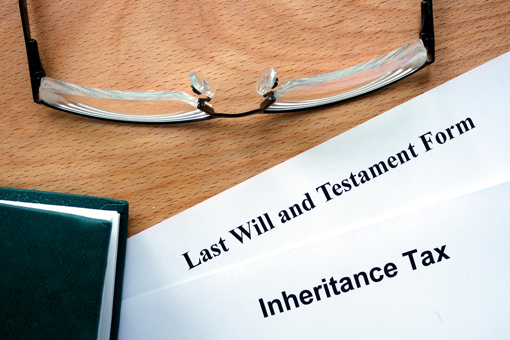 Papers with inheritance tax and testament form