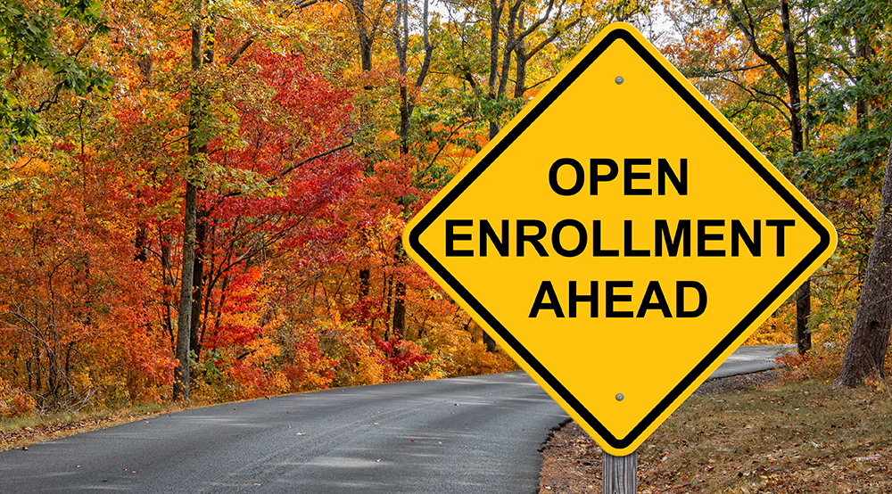 Open Enrollment Caution Sign With Autumn Road Background