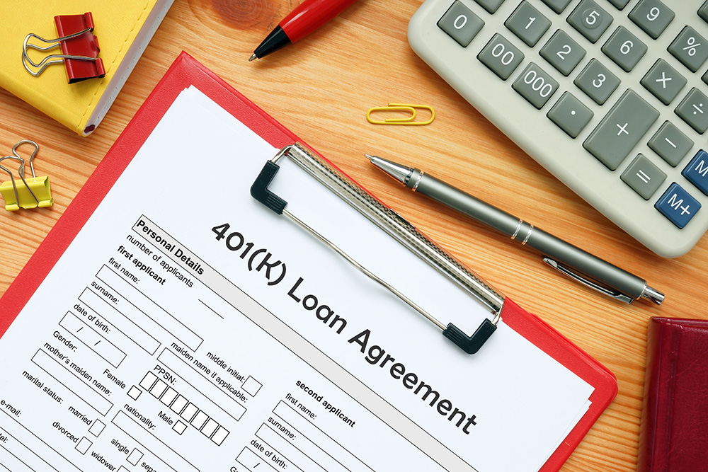 Business concept meaning 401(K) Loan Agreement with sign on the business paper 