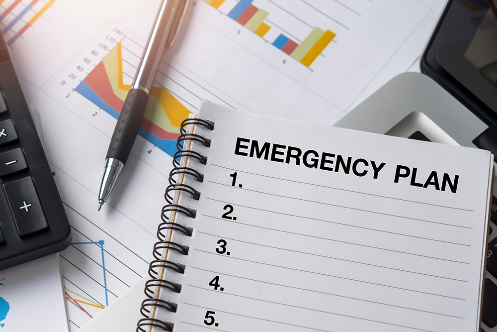 Concept of Emergency Preparedness Plan.Emergency Plan  list with notebook.Business Evacuation Training concept.