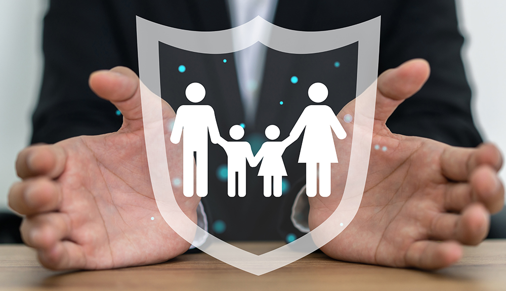 Human hand with family love care and holding shield guard protective gesture family, life, health, insurance, safe, real estate, support, insurance company, hospital, policy, life insurance concept	