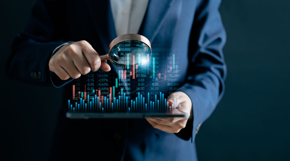 Businesswomen use magnifier glass find stock in stock markets, uptrends, growth economics, business strategy development, and opportunities for investment, take profit from funds, Financial Analyst. 