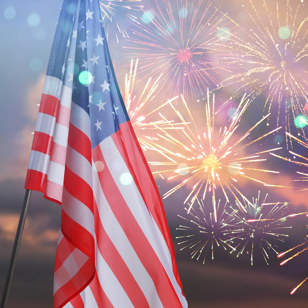 Flag of United States of America and fireworks in sky. National holiday greeting card design
