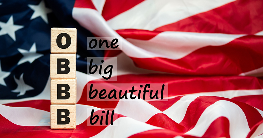 The One Big Beautiful Bill Act text Flag of the United States of America background.