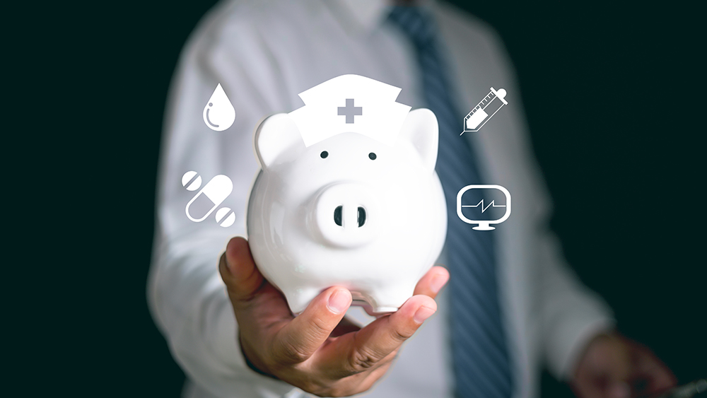 Businessman or  doctor saving money coins accounting in a pink piggy bank. for protect family and insurance concept. Protected from emergency by insurance and assurance health care life.